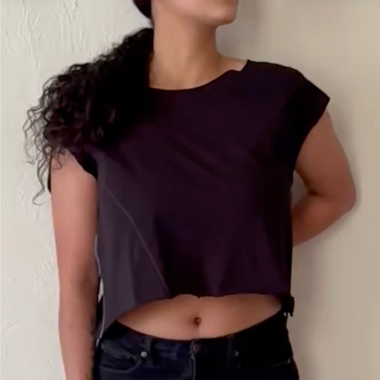 Model wearing Addie Cropped Muscle Tee, front view