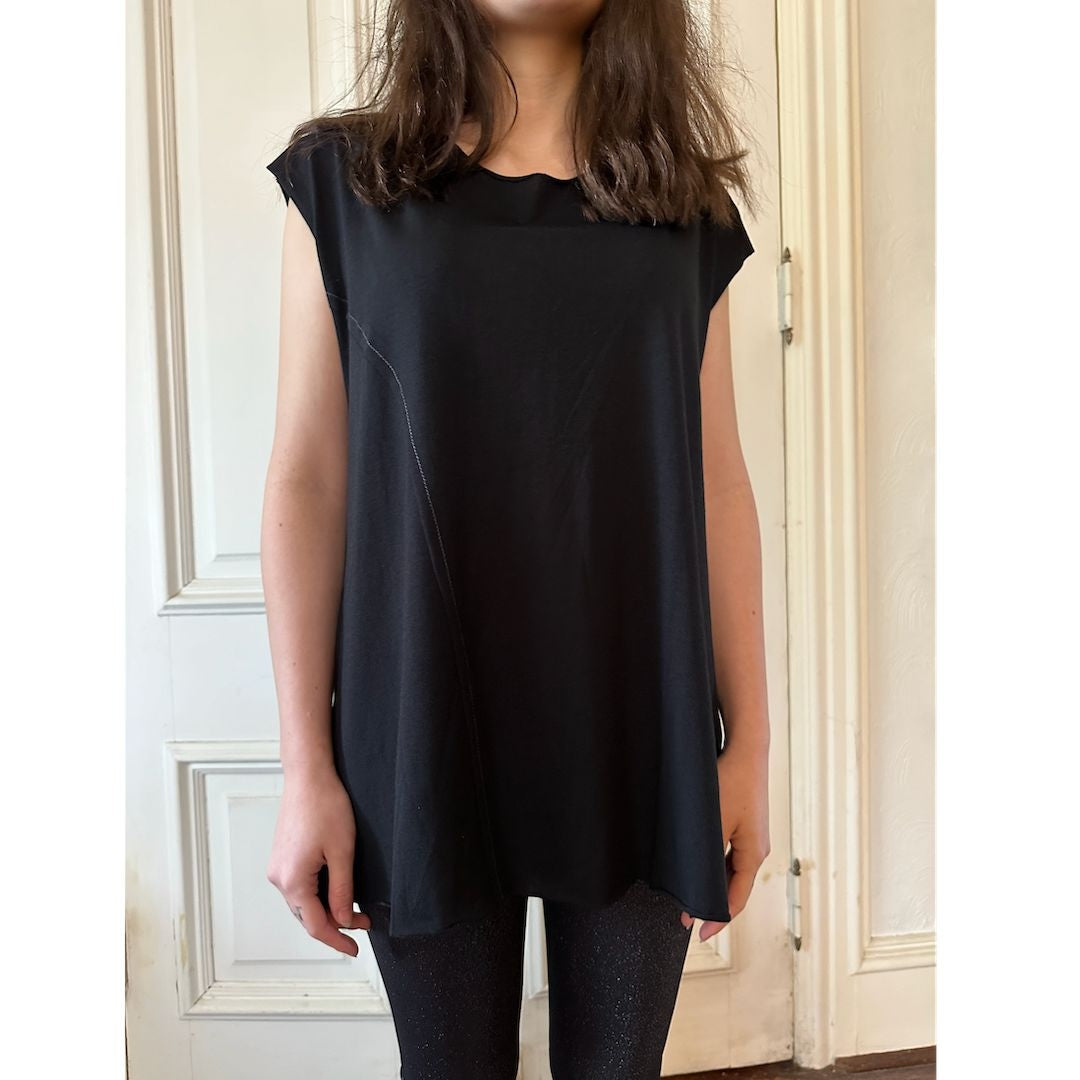 Front view of model wearing the Addison Muscle Tee