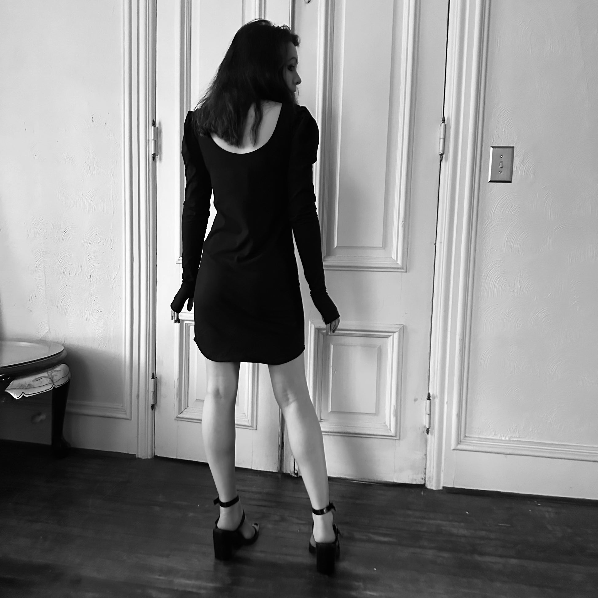 Black Long-Sleeved Cotton Fitted Mini Dress Puff Shoulders Thumbholes Midnight All Year Black Long-Sleeved Cotton Fitted Mini Dress Puff Shoulders Thumbholes Midnight All Year