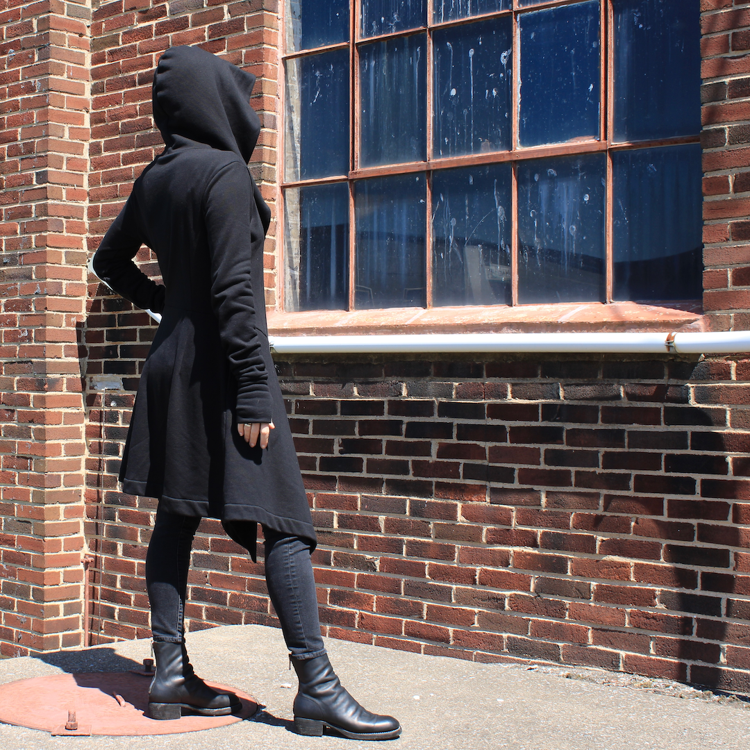 Model wearing the Winslow Coat, side-back view